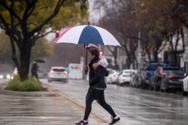 Cooler weather, light showers, and high surf continue across San Diego County