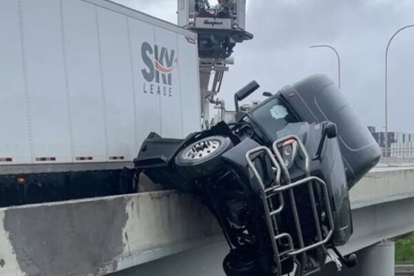 Driver left dangling off I-65 bridge in Louisville crash, pulled to safety by fire crew