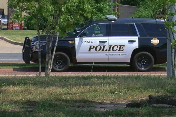 Person fatally struck by truck while crossing street in Longview