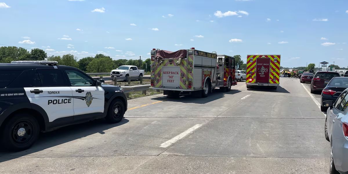 Topeka woman killed after car crosses median and collides head-on with another vehicle
