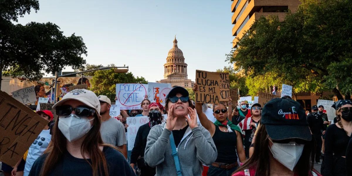 Protests Turn Violent as Anti-ICE Demonstrators Clash with Police in Blue City